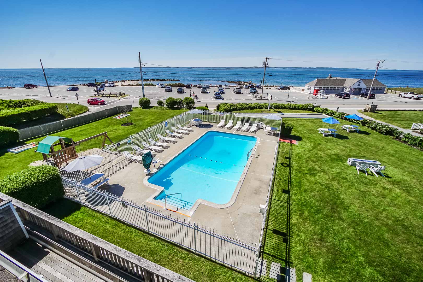A scenic view of the pool at VRI's Beachside Village Resort in Massachusetts.